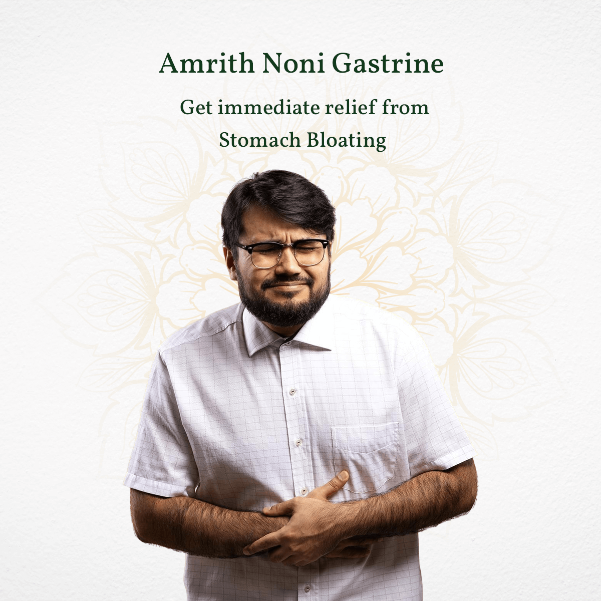 Man in white shirt and glasses with digestive health text highlighting stomach bloating relief on a light background